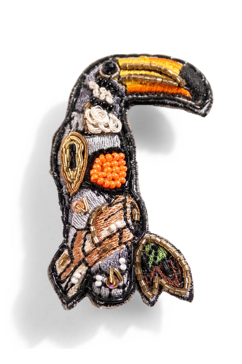 Toucan charm brooch