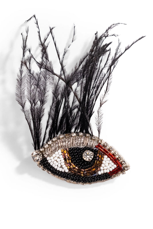 Wintry eye charm brooch